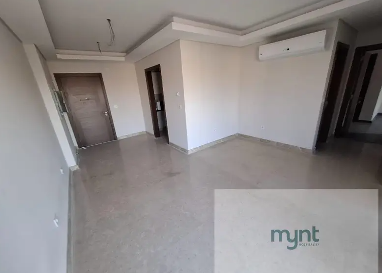 شقة نصف تشطيب غرفتين للإيجار في زد ويست الشيخ زايد | MYNT Hospitality