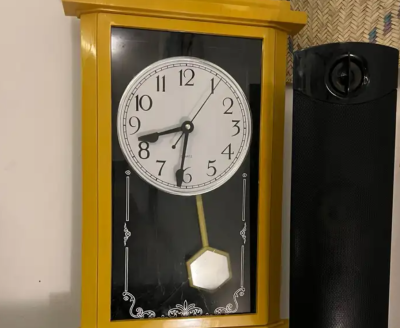 ساعه حائط بندول قديمه